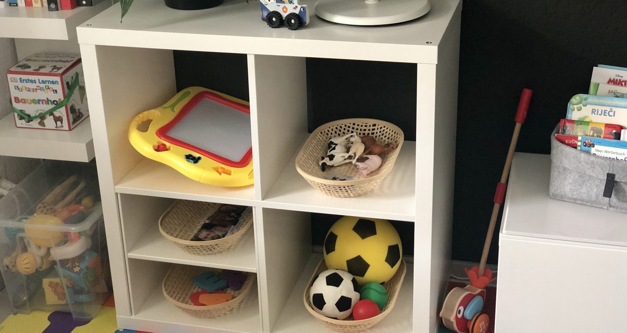 Our Montessori shelf at 19 months